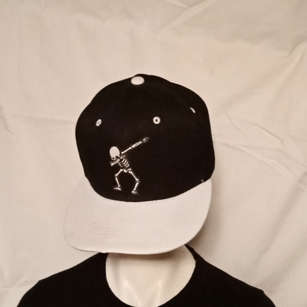 Baseball cap black and white with skeleton adjustable strap in the back
